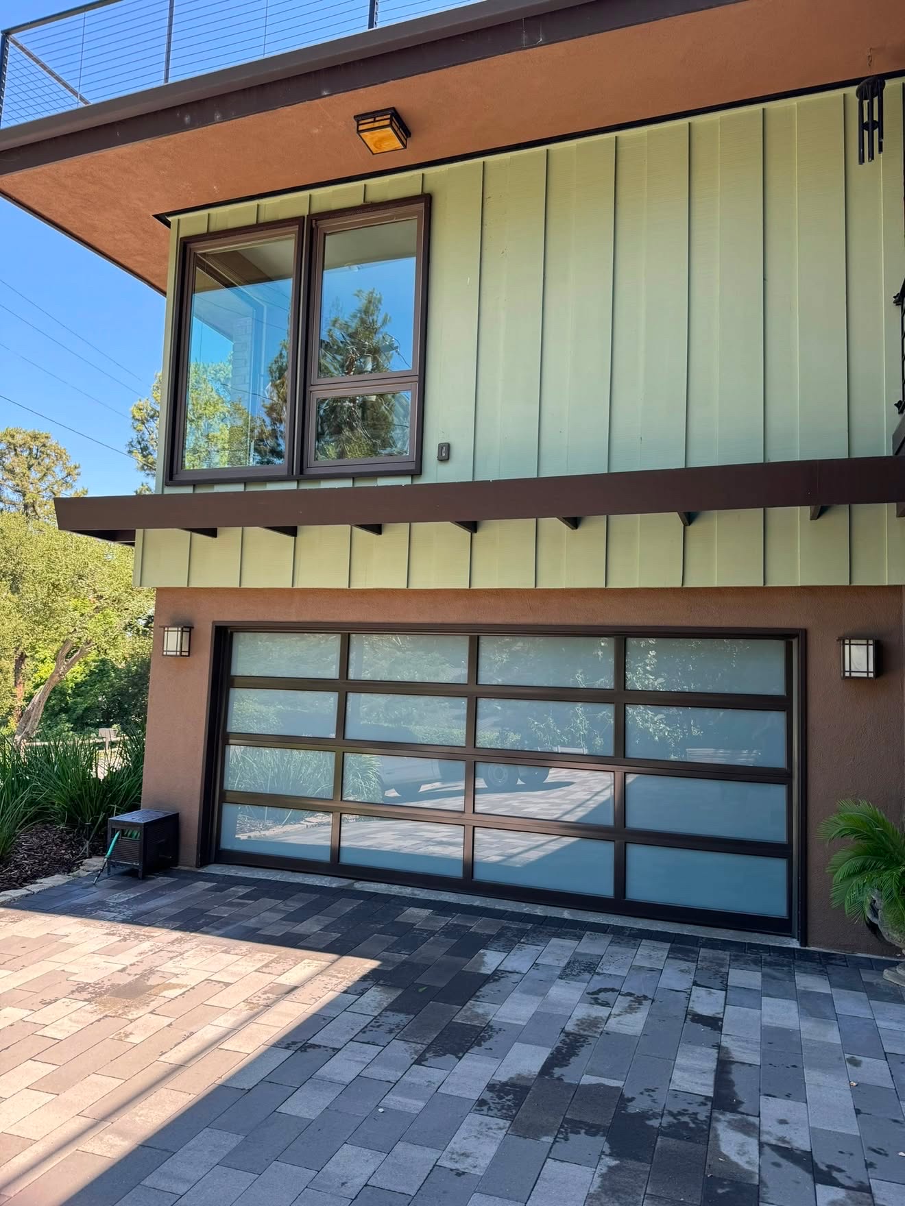 Cleaned upper windows and glass garage door panels