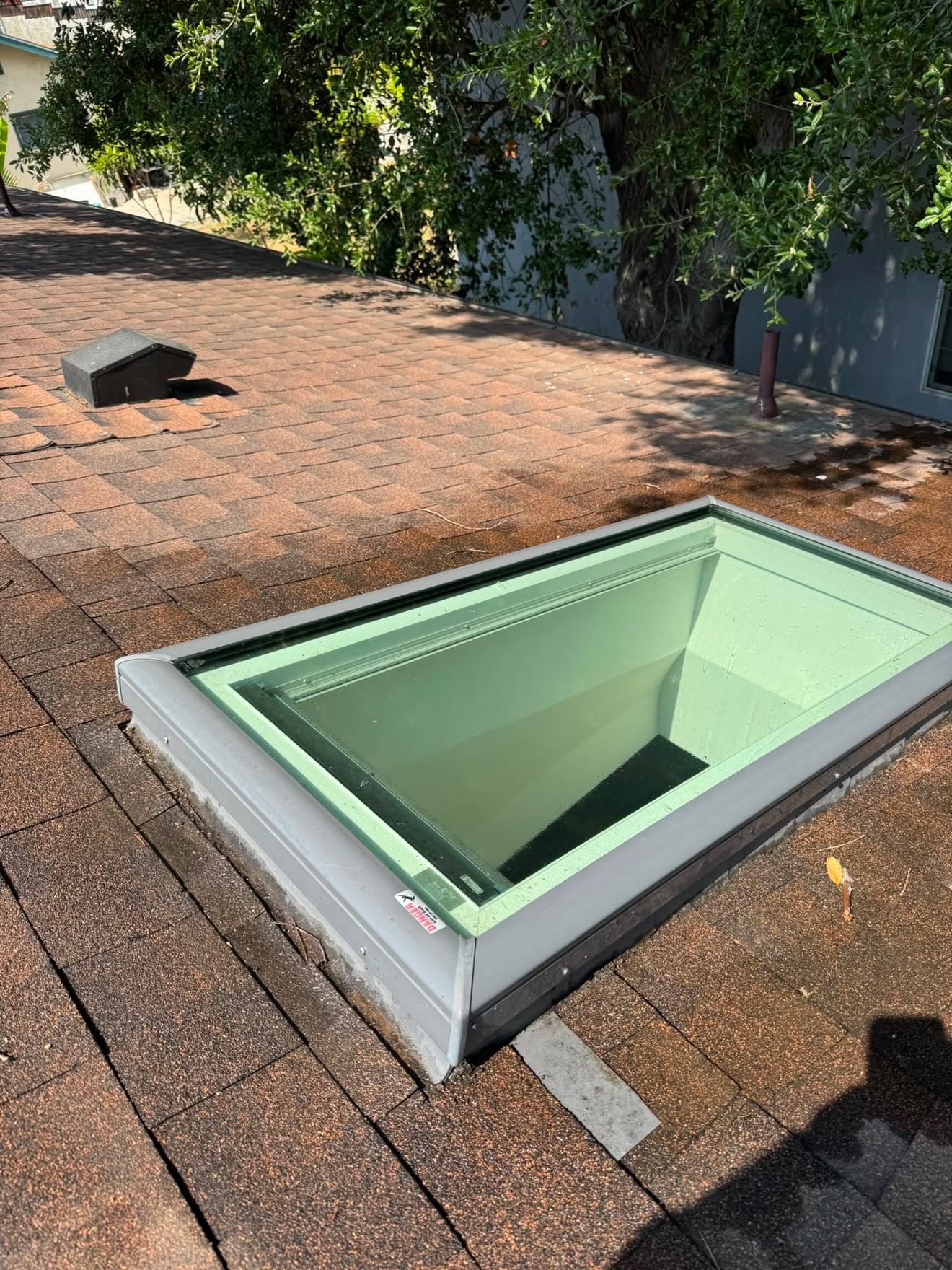 Rooftop skylight cleaned inside and out